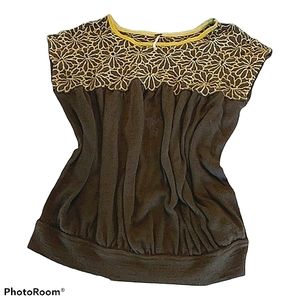 Free people green top with flowers on upper half s